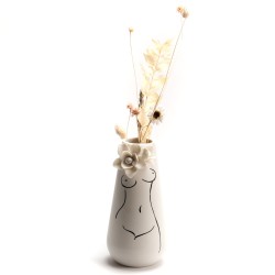 Vase silhouette corps fleur
